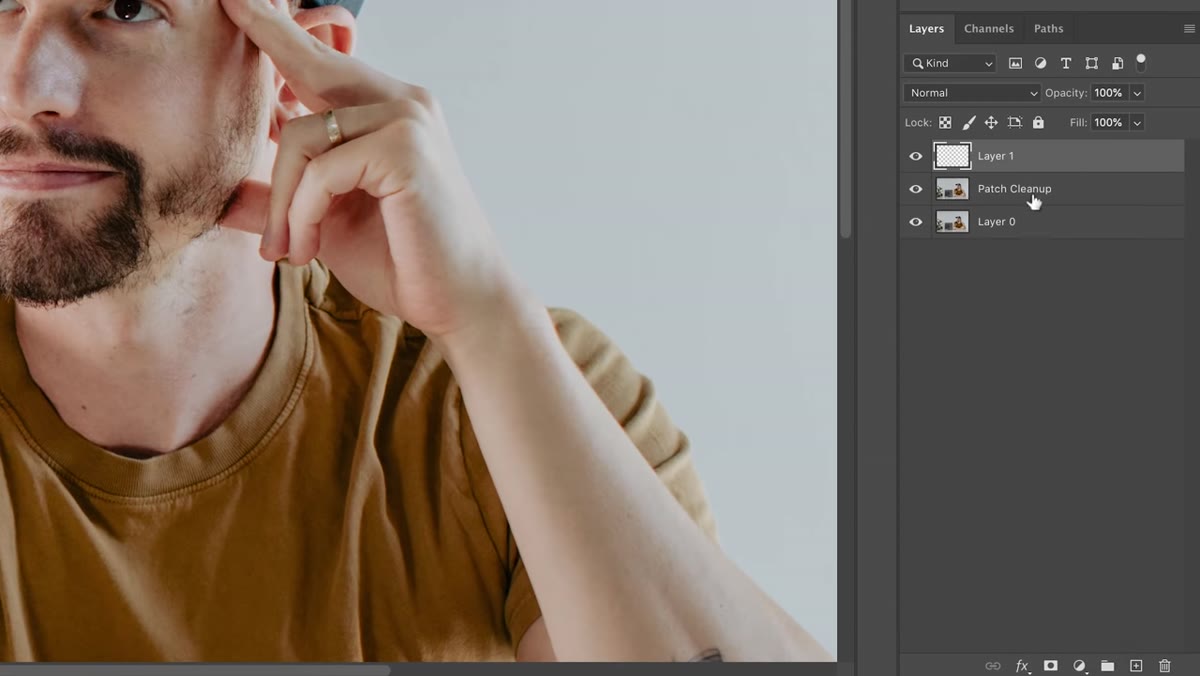 Clone stamp on new layer, flow set to 20 percent