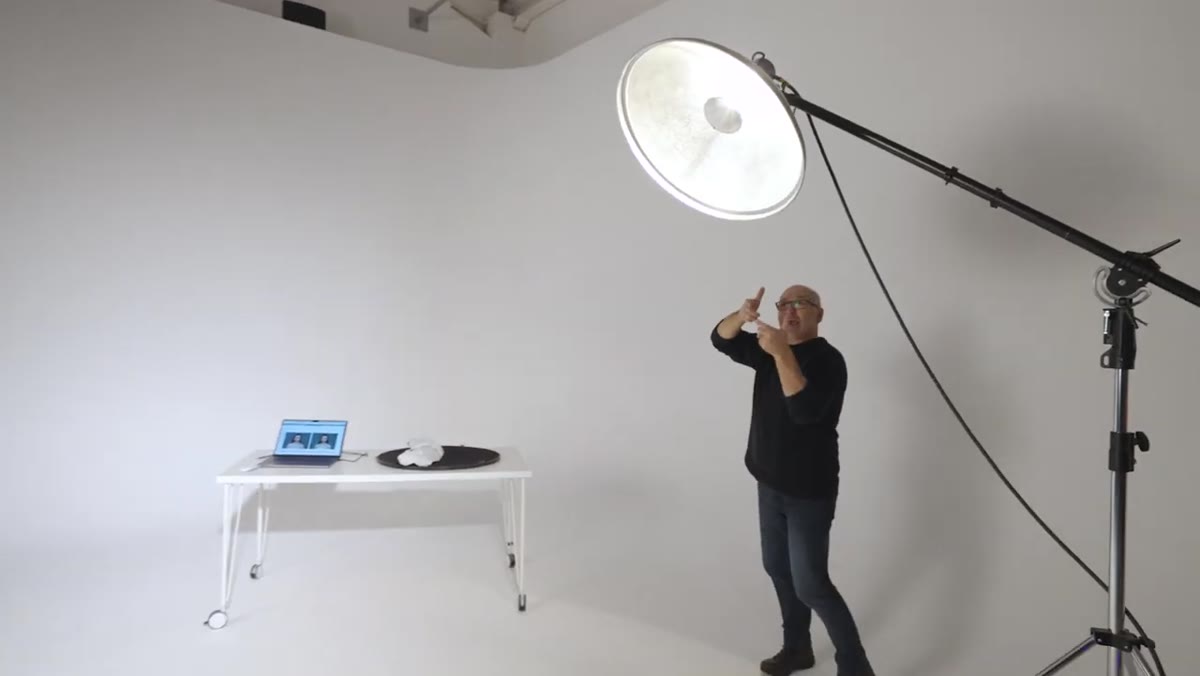 Carl showing ideal photographer position relative to dish and subject