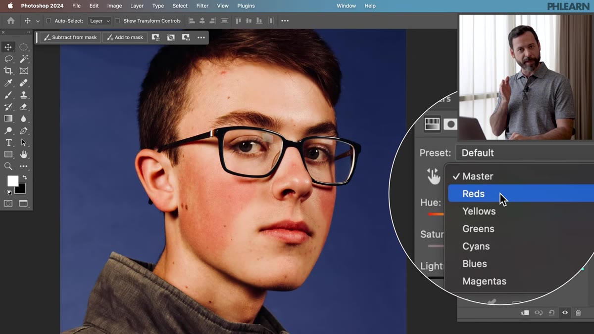 Hue/Saturation panel showing dropdown switched to Reds