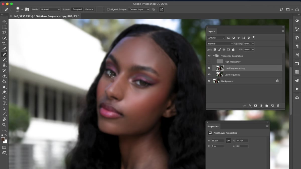 Full portrait visible with retouching partially complete