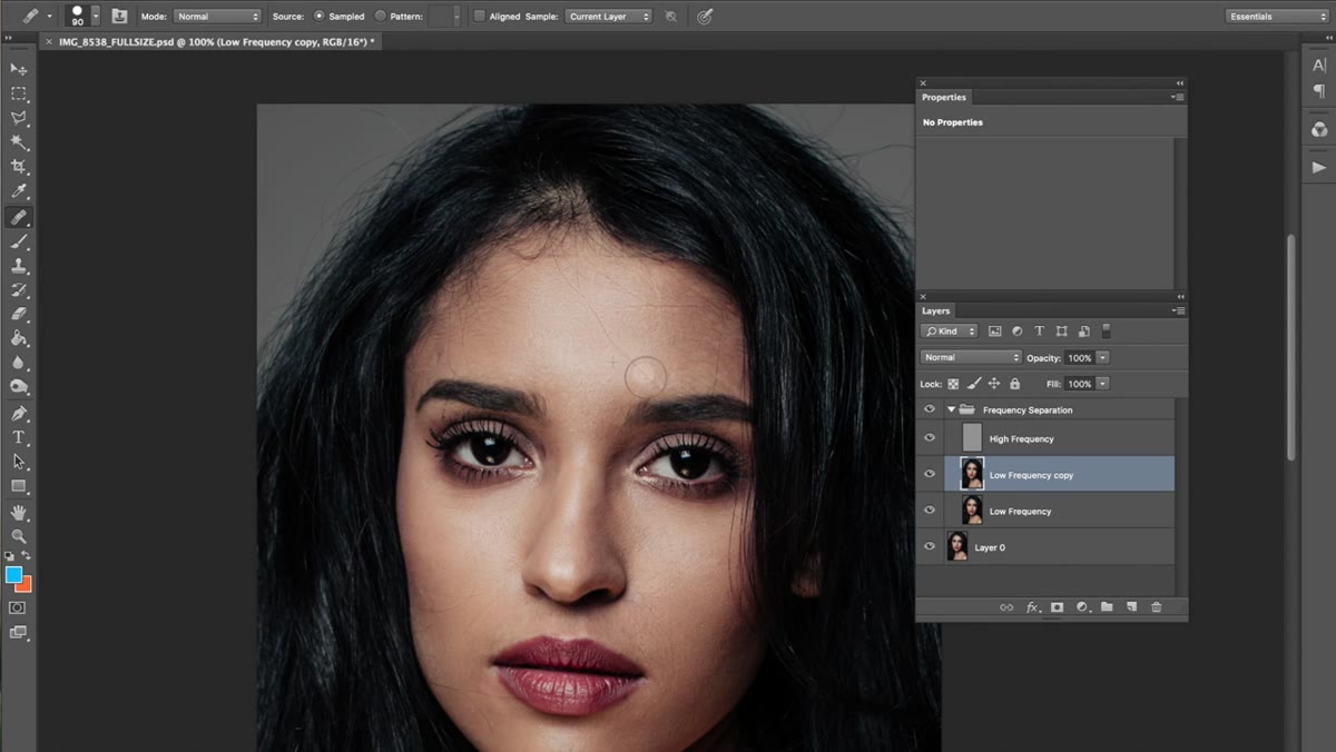 Painting over patchy skin tones on the low frequency layer