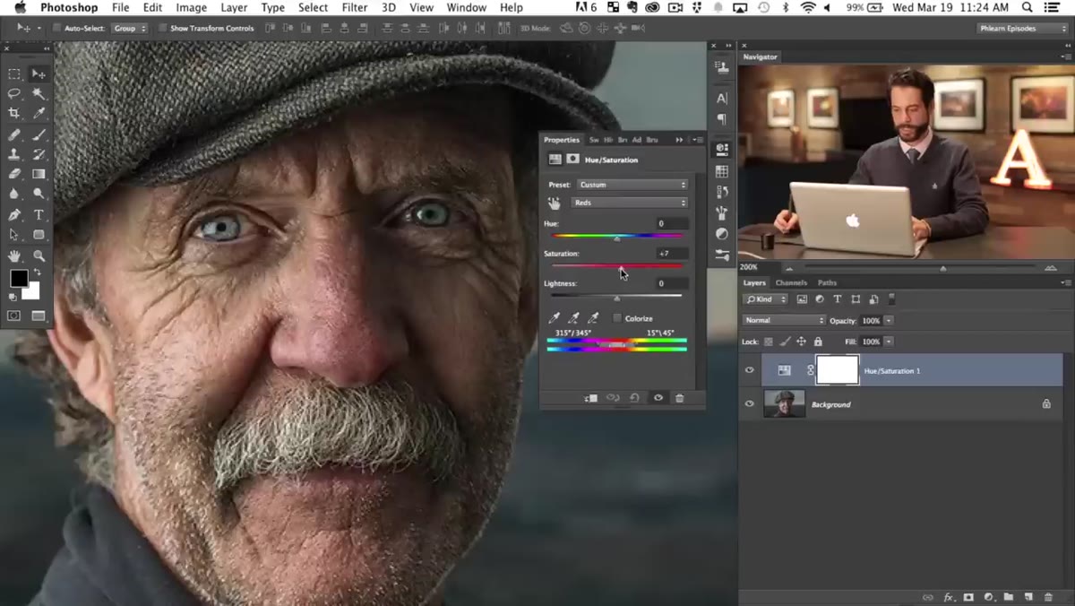 Saturation slider pushed high, showing affected red areas across the face