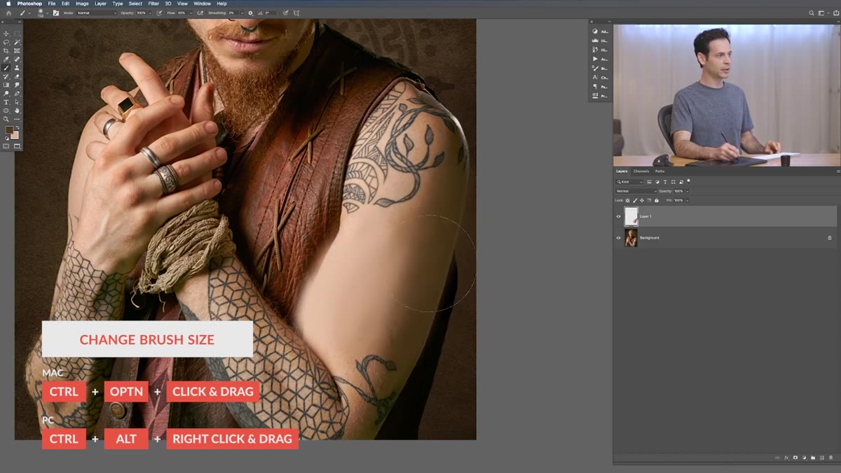 Large brush strokes extending deliberately beyond arm edge