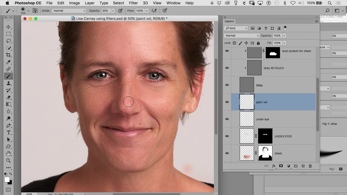 Soft brush painting a white stroke along the nose bridge
