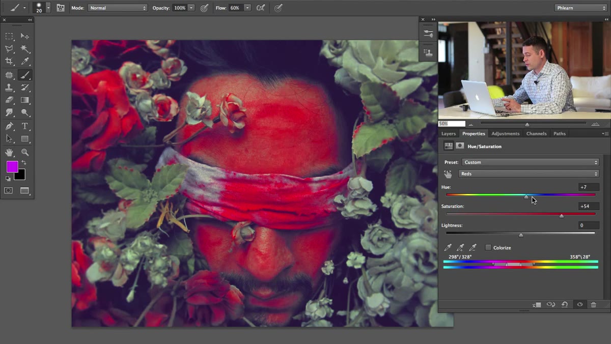 Saturation slider dragged high, showing red areas exaggerated on face