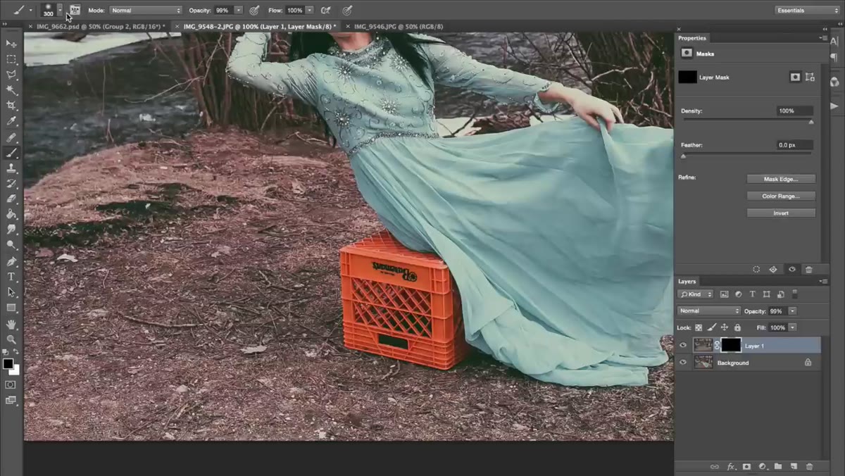 White brush painting over crate area on black layer mask